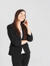 Portrait of young smiling brunette woman lady talking on mobile Royalty Free Stock Photo