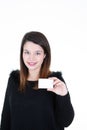 Portrait of young smiling business woman holding credit card blank Royalty Free Stock Photo