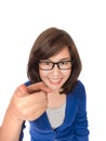 Portrait of young smiling business woman pointing finger at view Royalty Free Stock Photo