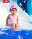 Portrait of young smiling child having fun in aquapark Royalty Free Stock Photo
