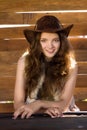 Portrait of young smiling cowgirl in stetson Royalty Free Stock Photo