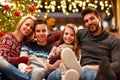 Portrait of smiling family on Christmas holiday Royalty Free Stock Photo