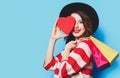 Woman with heart shape toy and shopping bags Royalty Free Stock Photo