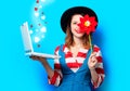 Woman with laptop and pinwheel with hearts Royalty Free Stock Photo