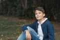 Portrait of young smiling Teen Boy looking at camera with a joyful smiling expression. Teenager confident and smart. copy space Royalty Free Stock Photo