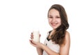 Portrait of young teenager girl with glass of milk, right view