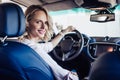 Smiling woman sitting in the car Royalty Free Stock Photo