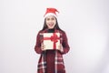 Portrait of young smiling woman wearing red Santa Claus hat isolated white background studio Royalty Free Stock Photo