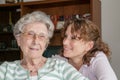 Portrait of granddaughter and her grandmother Royalty Free Stock Photo