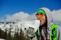 Portrait of young snowboarder girl With snow heart in hands Royalty Free Stock Photo