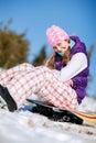 Portrait of young snowboarder girl