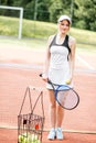 Young woman portrait on the tennis court Royalty Free Stock Photo