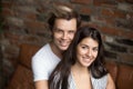 Portrait of young spouses hugging posing to camera Royalty Free Stock Photo