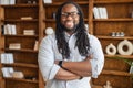 Portrait of a young stout african unshaven man with dreadlocks Royalty Free Stock Photo