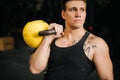 Portrait of Young strong man with perfect beautiful body wearing sportswear Royalty Free Stock Photo