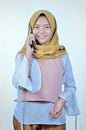 Portrait of a young student asian woman talking on mobile phone, speak happy smile Royalty Free Stock Photo
