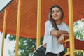 Portrait young student girl relaxing on a sunny day dreaming Royalty Free Stock Photo