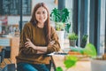 portrait young student wearing headphones studies online, distance learning, and keeps up to date on the global coronavirus Royalty Free Stock Photo