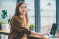 portrait young student wearing headphones studies online, distance learning, and keeps up to date on the global coronavirus Royalty Free Stock Photo