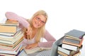 Portrait of young student woman with lots of books