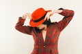 Portrait of young stylish girl. Fashion portret of elegant woman in hat and jacket. Studio shot