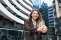 Portrait of young successful foreperson business woman outdoor. Cute intelligent female businessperson in smart casual wear Royalty Free Stock Photo