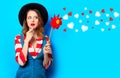 Woman with red pinwheel with hearts Royalty Free Stock Photo