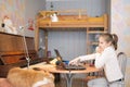 Portrait of Young Teenage Girl Working with Laptop