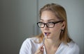 Portrait of the young thinking business woman looking aside Royalty Free Stock Photo