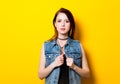 Portrait of young trendy adult woman in jeans clothing