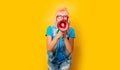 Trendy girl orange hat with megaphone