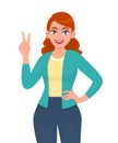 Portrait of young trendy woman showing victory, V, two or peace sign with fingers. Girl gesturing winner sign. Female character. Royalty Free Stock Photo