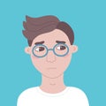 Portrait of young unsmiling guy in glasses.