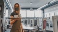 Young waitress standing in cafe. girl the waiter holds in bunches a tray with utensils. Restaurant service Royalty Free Stock Photo