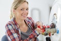 Portrait young woman apprentice plumber Royalty Free Stock Photo