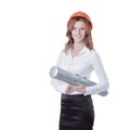 Portrait of a young woman architect with orange hard hat and drawings Royalty Free Stock Photo