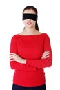 Portrait of the young woman blindfold