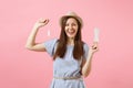 Portrait of young woman in blue dress holding sanitary napkin, tampon for variant safety menstruation days isolated on Royalty Free Stock Photo