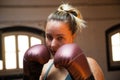 Portrait of young woman at boxing training session Royalty Free Stock Photo