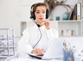 Portrait of young woman call center worker Royalty Free Stock Photo