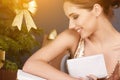 Portrait of young woman with christmas present boxes Royalty Free Stock Photo