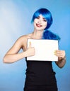 Portrait of young woman in comic  pop art make-up style. Female with paper in hands Royalty Free Stock Photo