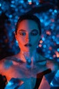 Portrait of young woman in cosmic image of extraterrestrial goddess with shiny body art Royalty Free Stock Photo