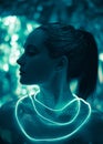 Portrait of young woman in cosmic image of extraterrestrial goddess with shiny body art and neon lights Royalty Free Stock Photo