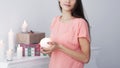 Portrait of a young woman with a decorative candle .photo with copy space