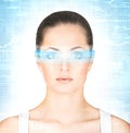 Portrait of a young woman with digital glasses