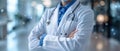 Portrait of young woman doctor with white coat standing in hospital Royalty Free Stock Photo