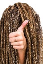 Portrait of young woman dreadlocks gesturing with finger hand