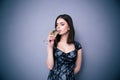 Portrait of a young woman drinking champagne Royalty Free Stock Photo