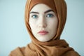 portrait of a young woman eastern type in the modern Muslim clothes and beautiful headdress Royalty Free Stock Photo